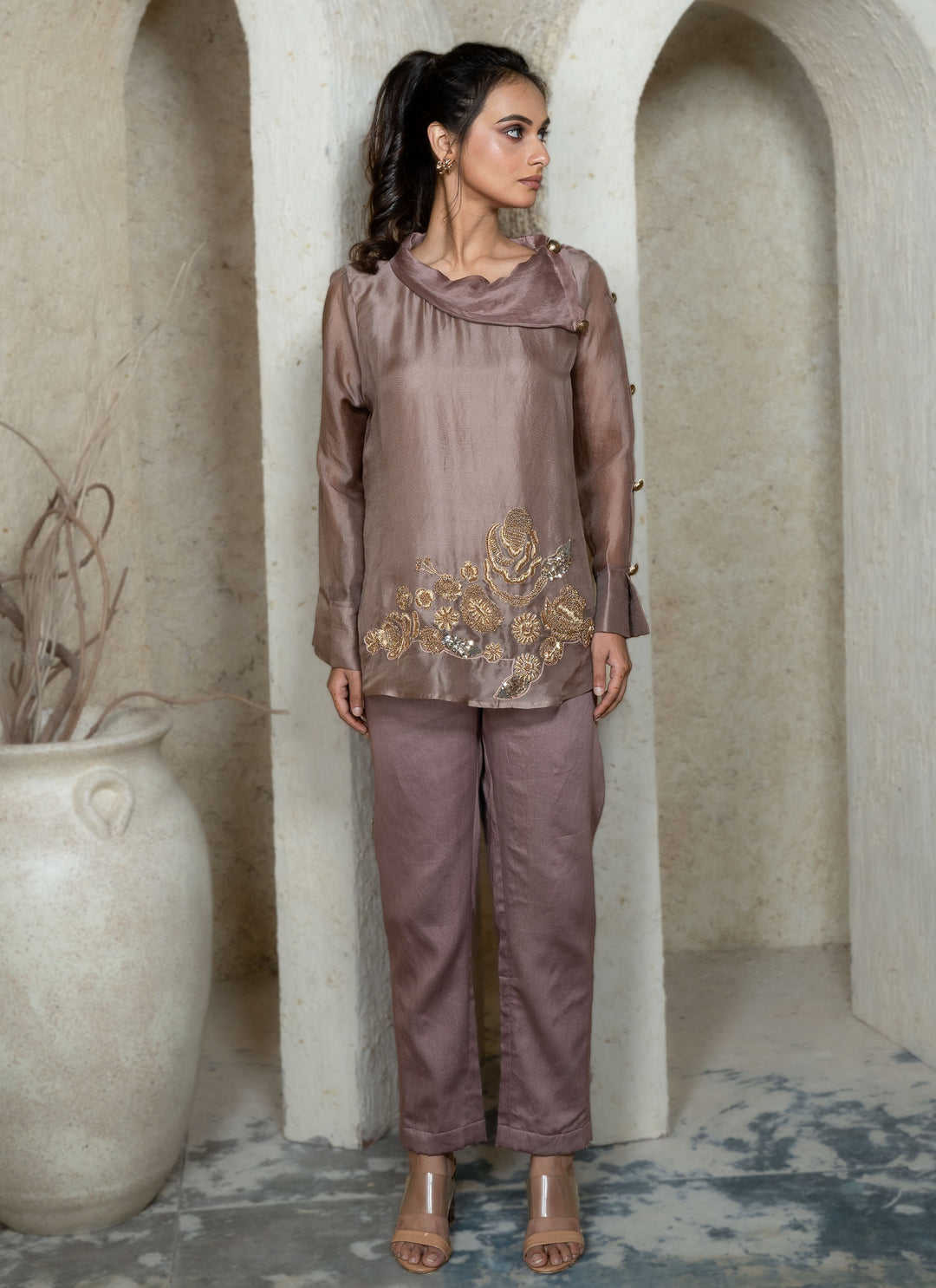 Woman wearing a champagne brown co-ord set with zardozi embroidery