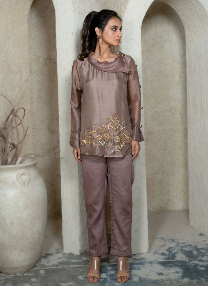 Woman wearing a champagne brown co-ord set with zardozi embroidery